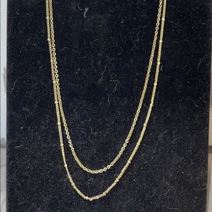 Gold tone choker necklace